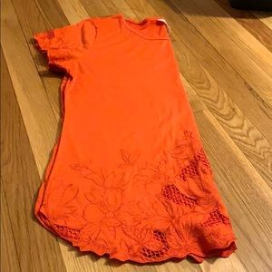 Orange ADIVA shirt with floral cutouts (L)